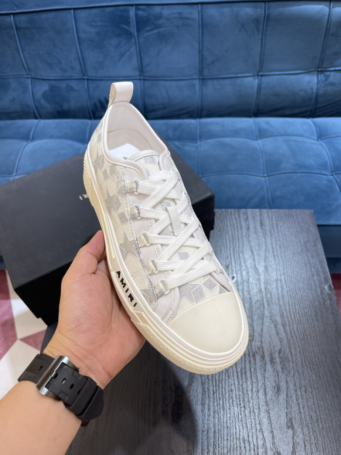 amiri* appliquéd leather and canvas sneakers