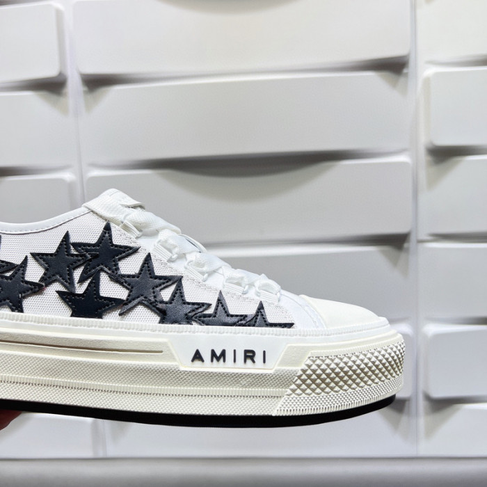 amiri* appliquéd leather and canvas sneakers